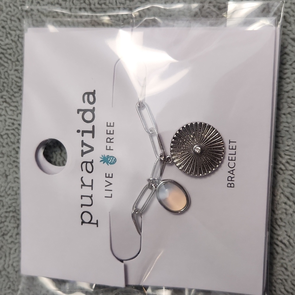 Silver bracelet with charm